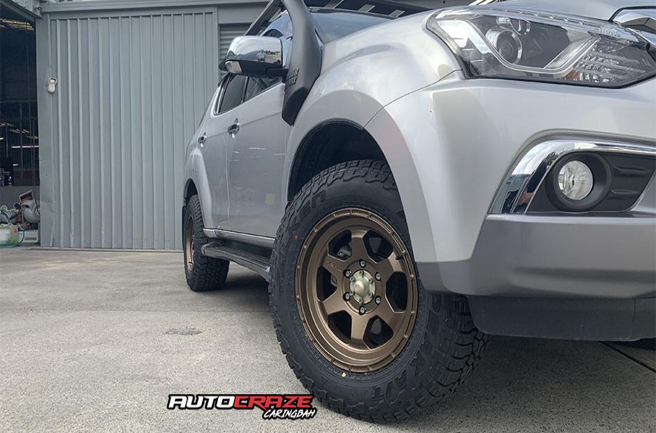 ISUZU MU X SHOK BRONZE